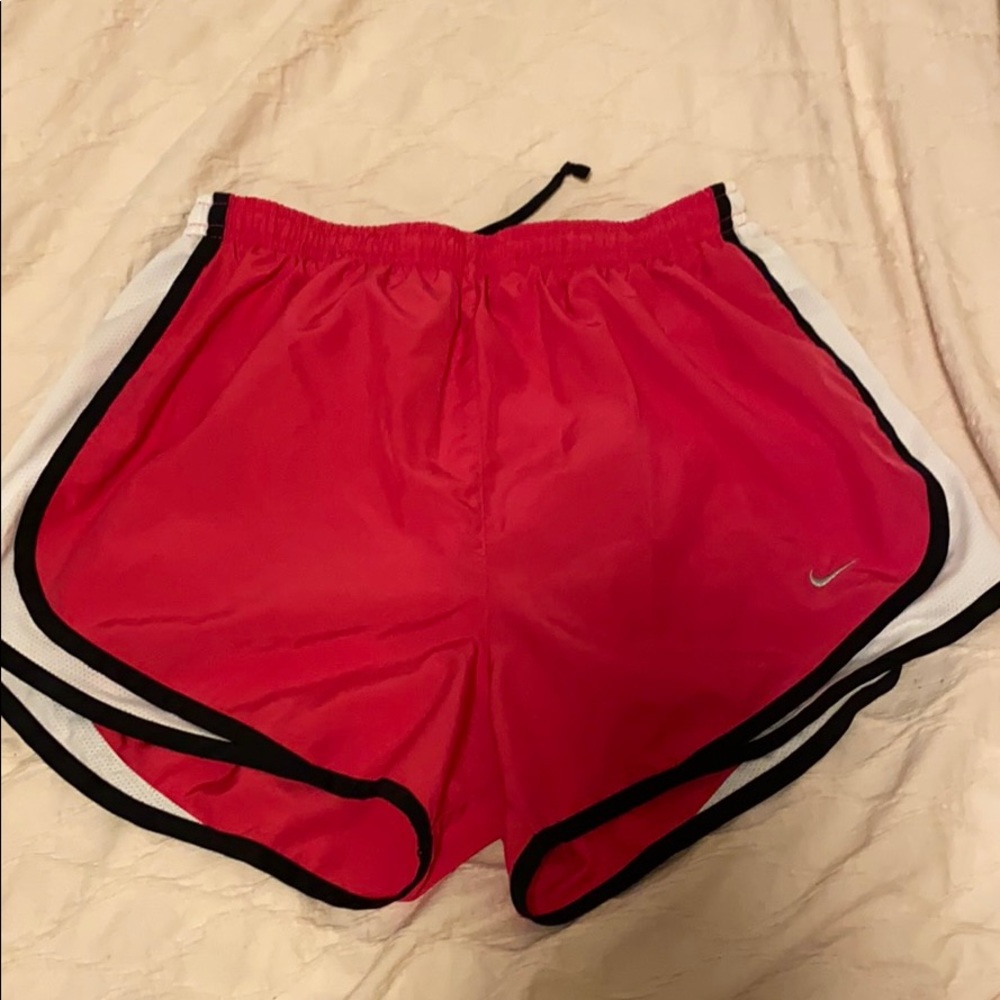Bright pink Nike shorts